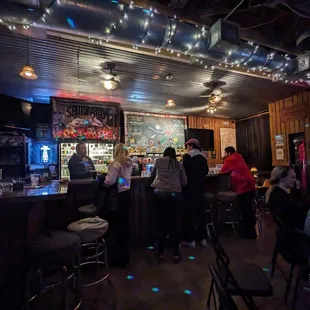 people sitting at the bar