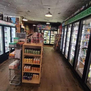 Most of these coolers are filled with beers you buy by the single.