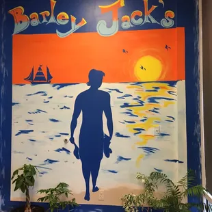 a man walking on the beach