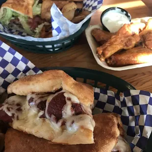 Top is Cap'n Jack sandwich; bottom is CannonBall. Beautiful wings are photo-bombing in the corner