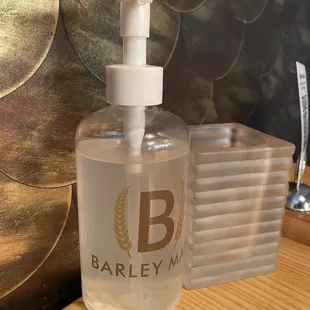 Hand sanitizer at table