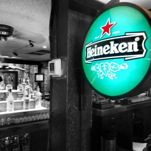 a neon sign in a bar