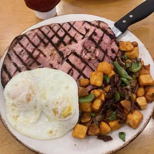 Ham Steak and Eggs* with Breakfast Potatoes added bell peppers and onion ---- so much food!!