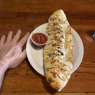 Sausage and mushroom calzone.