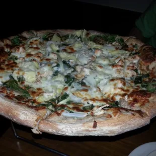 Jerk chicken artichoke spinach pizza