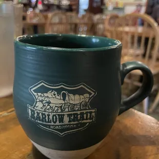 a coffee cup on a table