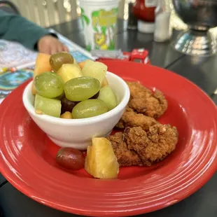 Kid&apos;s chicken fingers and fruit. Not worth the price. The chicken fingers were mostly batter and dry.