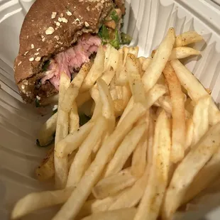 Tuna burger with fries boxed up