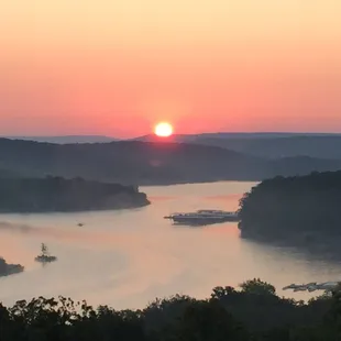 a sunset over the water