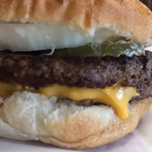 8 oz cheeseburger with lettuce, tomato, mayo, pickles and onion