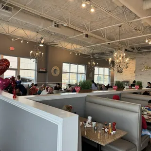 people sitting at booths