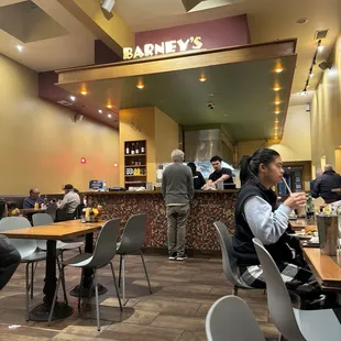 Guy waiting to be helped at counter