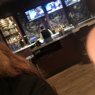 Older man with glasses as the bare tender degrades customers! Unacceptable and don't go!