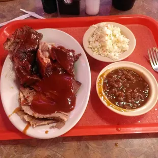 Ribs, sliced beef , coleslaw and baked beans