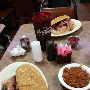 Brisket and link PoBoy. also a side of baked beans! (We requested the fatty part of the brisket) it was awesome!!