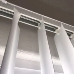 Vertical blind slat that was fixed for $97.00. Notice the tape.