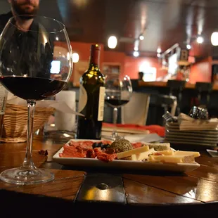 Charcuterie, bread, cheese, and wine