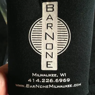 a person holding a can holder