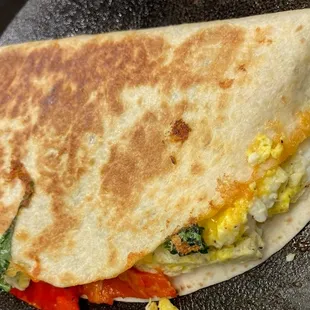 a breakfast quesadilla in a skillet