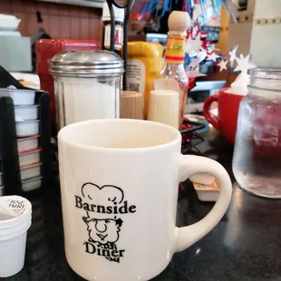a cup of coffee on a counter