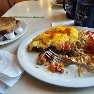 Humpty Dumpty omelet and wheat toast.