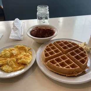 Eggs, chicken fingers, and a waffle.