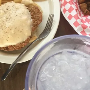 Chicken fried steak and fries $7.99 fried okra $1.50 soda pop $1.35 and awesome crushed ice.
