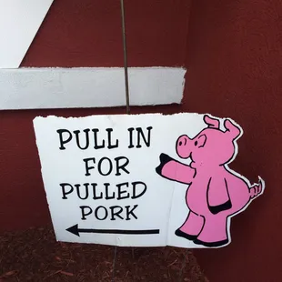 a sign for pulling pulled pork
