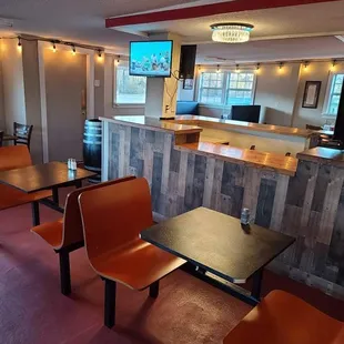 tables and chairs in a restaurant