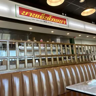 Kitchen behind dining room