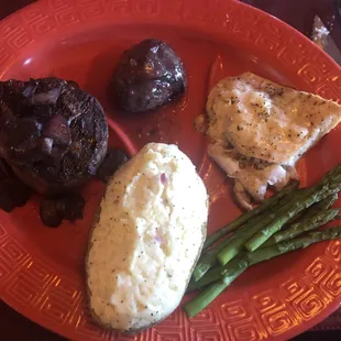 Filet, duck breast, halibut, twice baked potato and asparagus was soooo good and huge portions