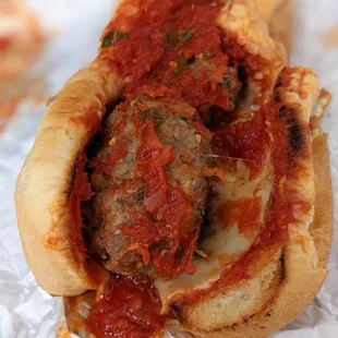 Mom&apos;s Italian Meatball Sandwich. Seasoned beef meatballs topped with homemade marinara, with cheese. $10 + $1 = $11 before tax.