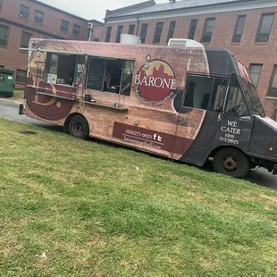 a food truck parked in front of a building