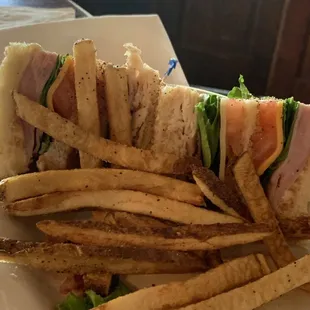 Club sandwich with fries
