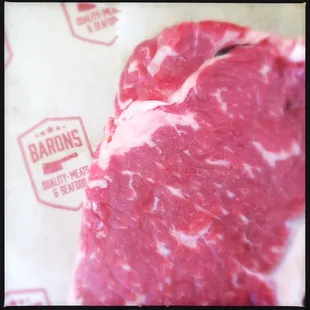 Detail - Awesome 1.75in thick NY Strip steaks from #baronsqualitymeats on Church here in SF. #steak #nystrip #charcoal