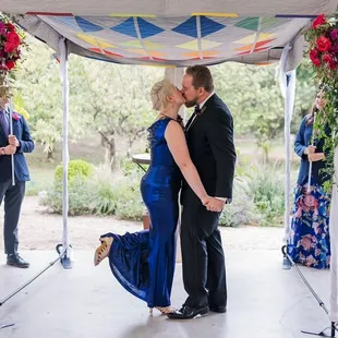Our ceremony with the foliage as a beautiful backdrop from outside the farmstead building.