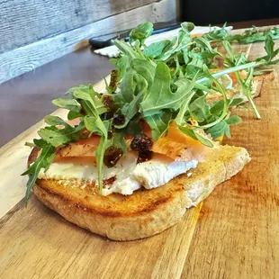 Smoked salmon, cream cheese, arugula &amp; salsa macha on toast