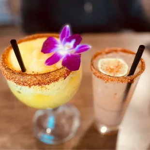 two cocktails on a table