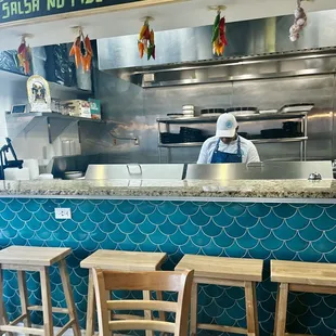 a chef behind the counter