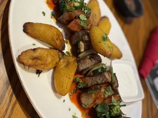 La Curva Peruvian Chicken Tex-Mex Bar & Grill