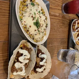 Cauliflower tacos and street corn. Blueberry margarita and a strawberry mango infusion margarita.