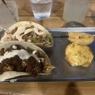 Cauliflower taco (front)  Lobster taco  Jalapeño corn muffin with honey butter