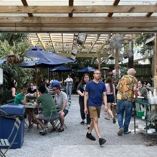 View of the patio full of happy people