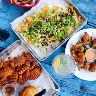 Burger, coconut shrimp, nachos
