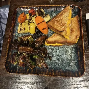 Grilled cheese with Brussel sprouts and seasonal veggies.