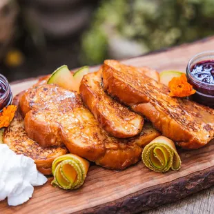 Sunday Brunch featuring sharable boards, &amp; $3 Mimosas. Photo: Tres Leches French Toast-
Macerated Berries, Piloncillo Creme Anglaise