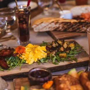 Sunday Brunch featuring sharable boards, &amp; $3 Mimosas. Photo: Plain Jane-
Eggs, Charred Breakfast Potatoes, Applewood Smoked Bacon, arugula