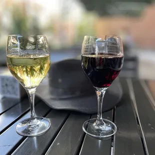 two glasses of wine on a table