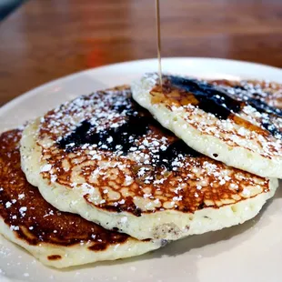 BLUEBERRY PANCAKES cornmeal batter, warm amber syrup, butter