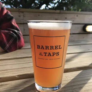 a glass of beer on a table